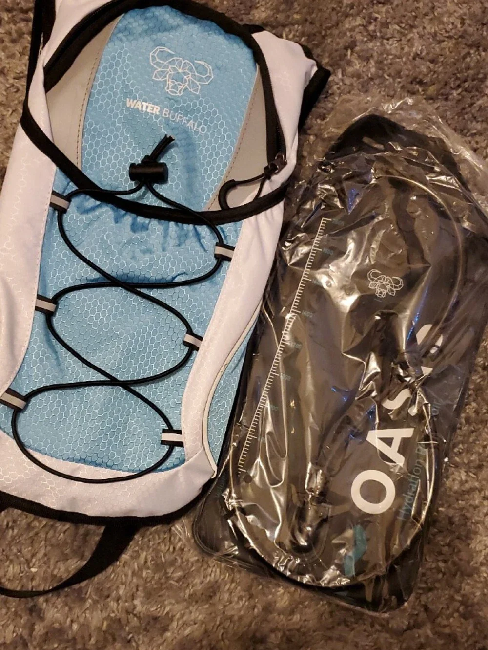 Water Buffalo Hydration Pack in Light Blue and White